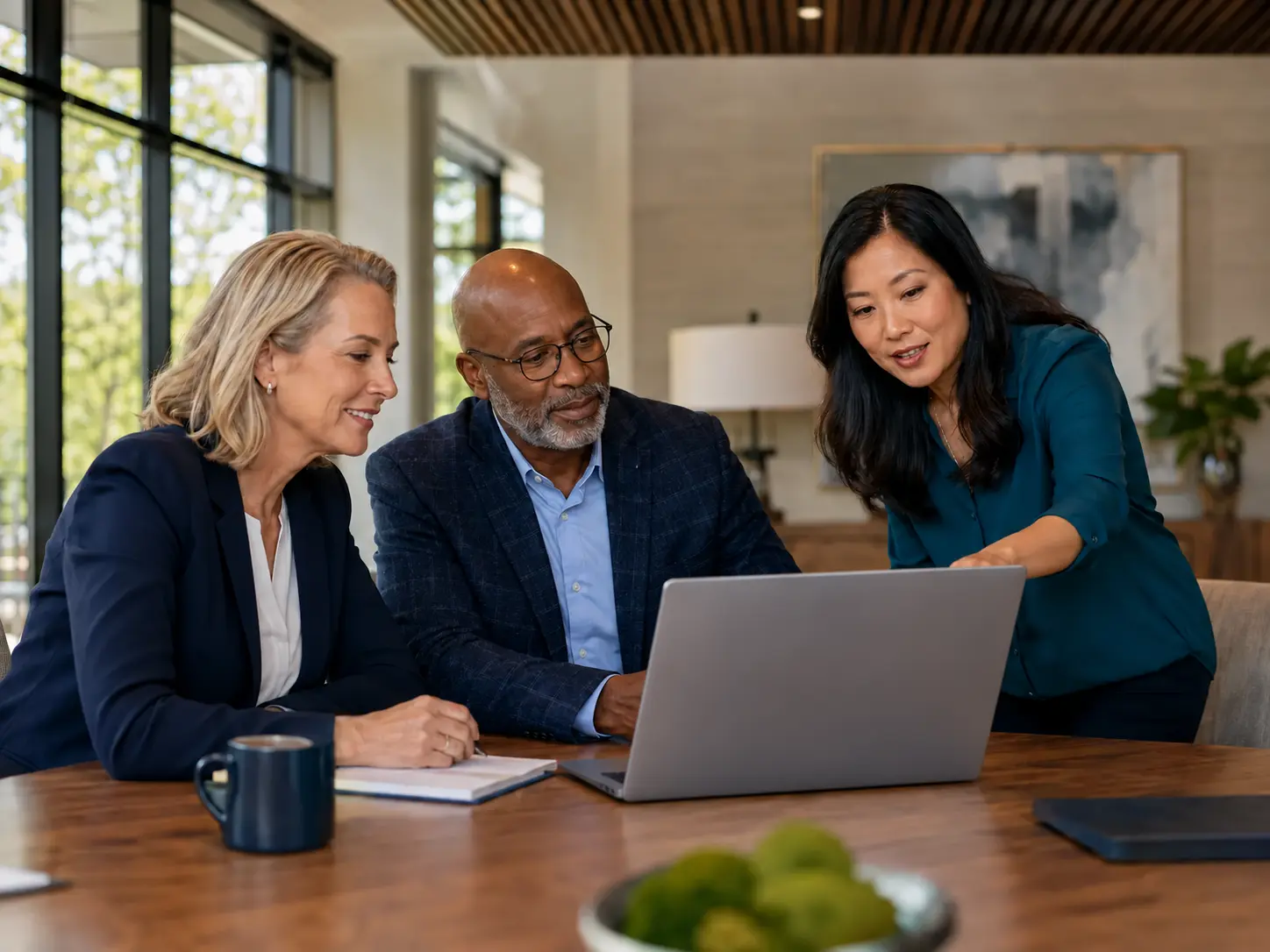 Senior-care leaders reviewing analytics together